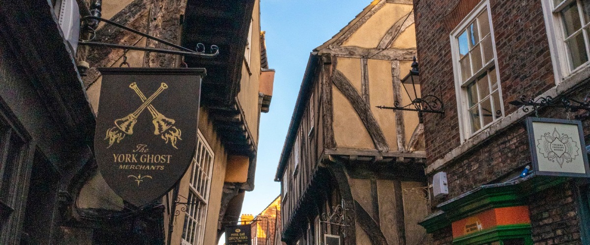 York shambles with old sinage and buildings on a slant
